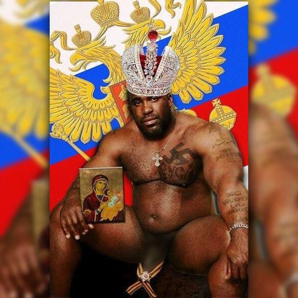 В России запретили картинку с темнокожим мужчиной на фоне флага РФ и с георгиевской лентой