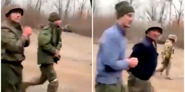 ✔️Украинские военные гонят колонну пленных российских оккупантов под Харьковом (Видео)